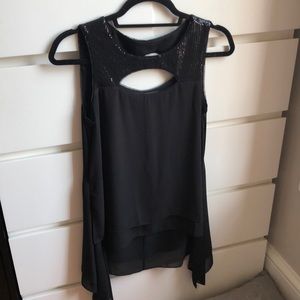 Beautiful BCBG black flowy sleeveless blouse